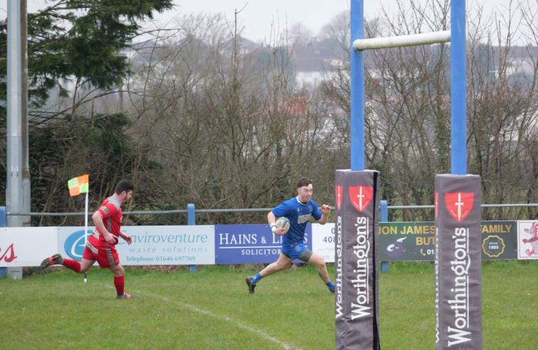 Jack Evans scores a try for The Blues. Picture Will John